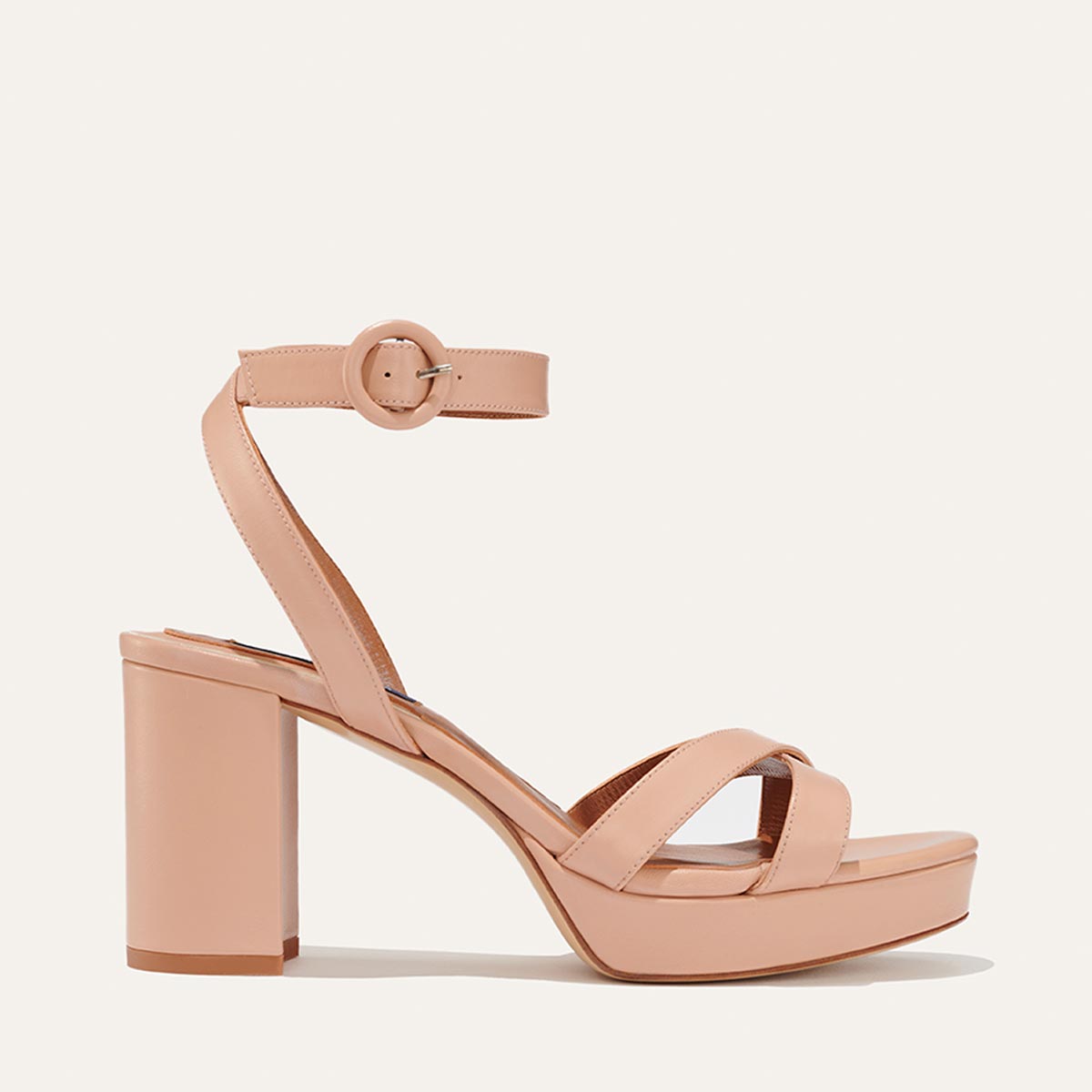 Margaux's classic and comfortable Platform Sandal in nude pink nappa leather with crossed straps and a walkable block heel