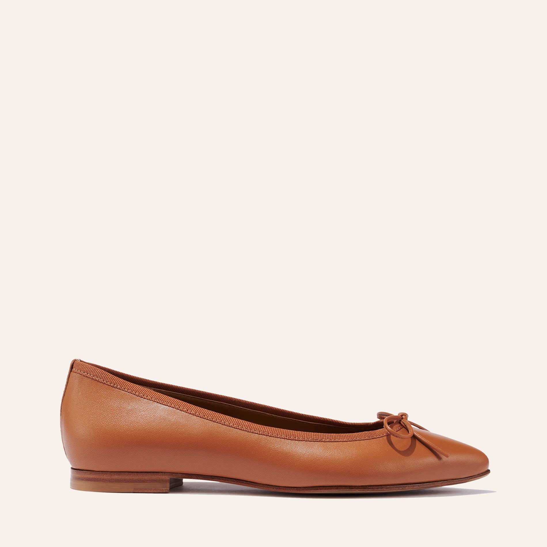 Margaux's classic and comfortable Pointe ballet flat in soft, saddle brown Italian nappa leather with an elegant pointed toe