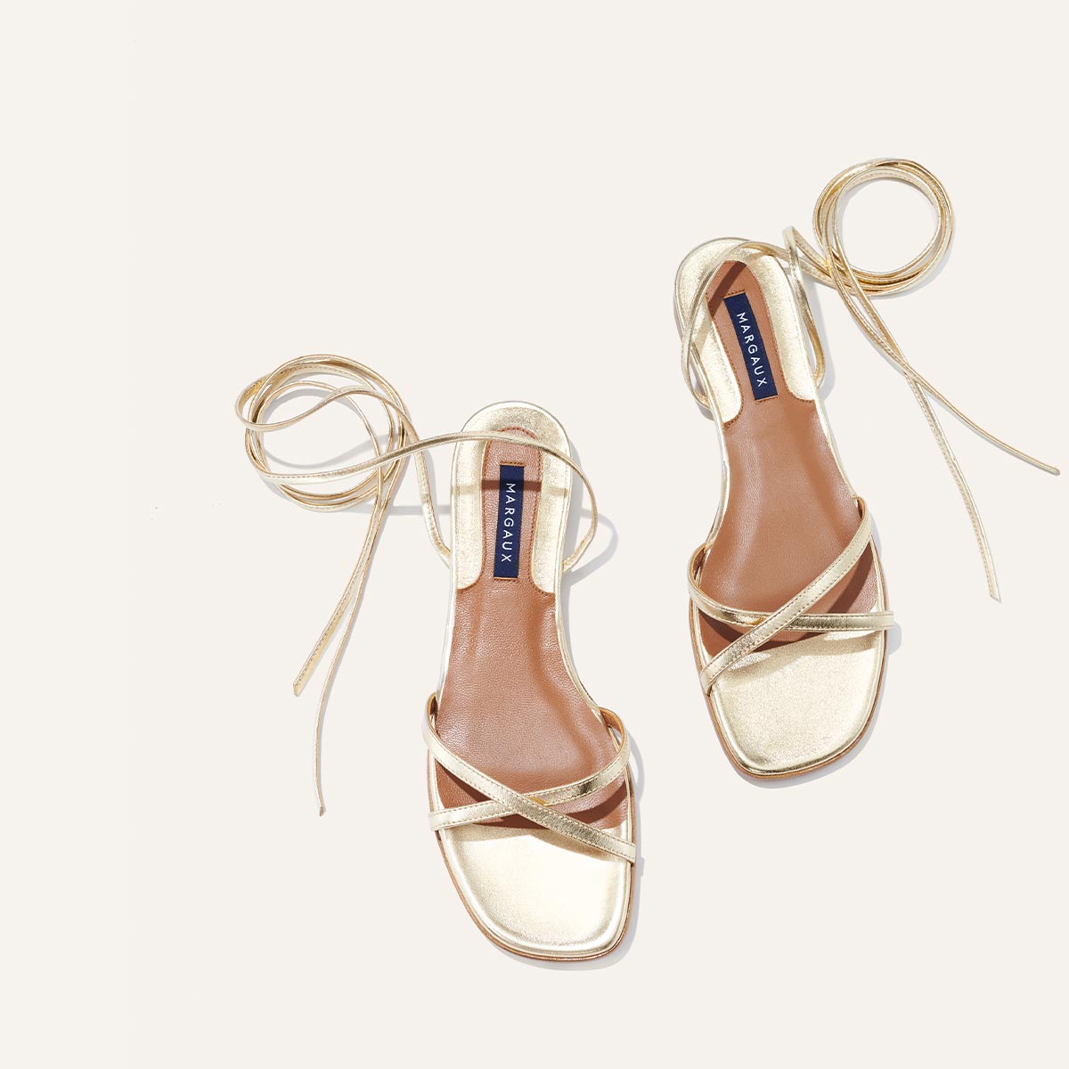 Padlock leather thong sandals in gold - Tom Ford | Mytheresa